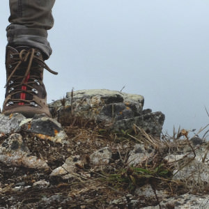 Youth wearing boots on hiking trip